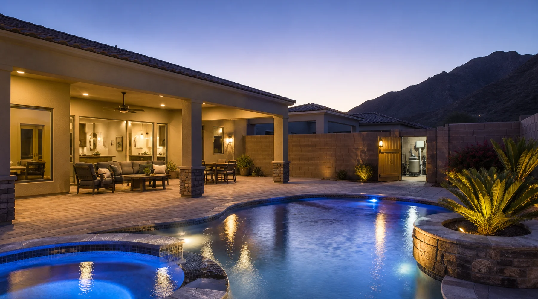 Finished Arizona residential and commercial pool with clear water and its equipment area beyond the pool.